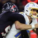 Watch: Justin Herbert matches season interception total with three picks in three quarters