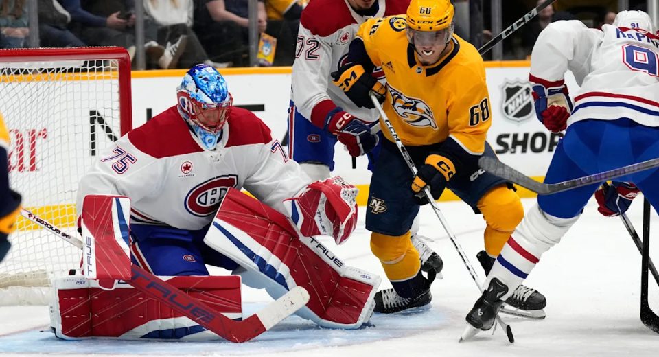 Caufield and Laine score in 2nd period to rally the Canadiens to a 2-1 win over the Predators