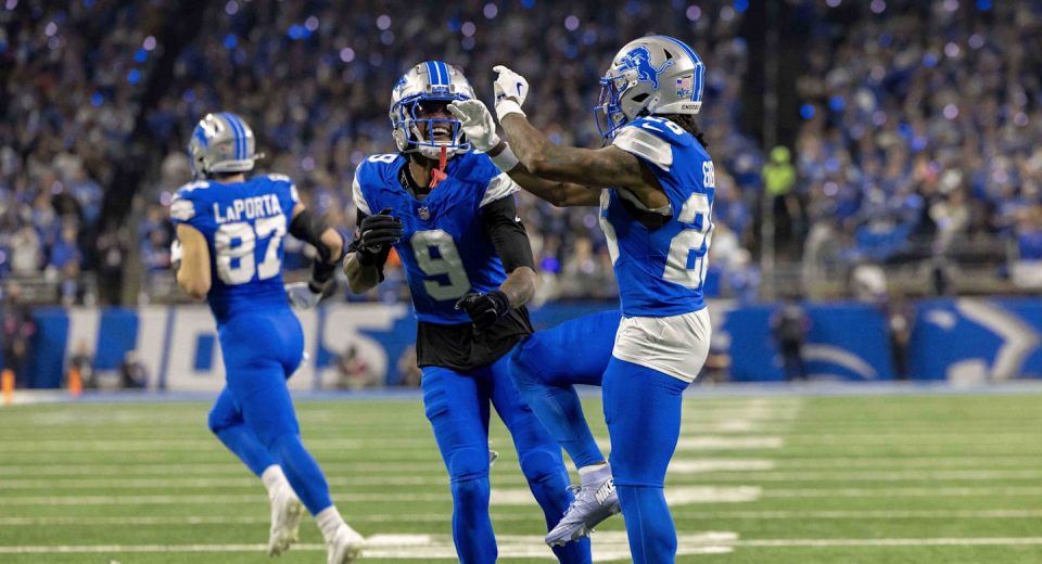 Jameson Williams lets Jordan Addison know Detroit Lions receivers are best