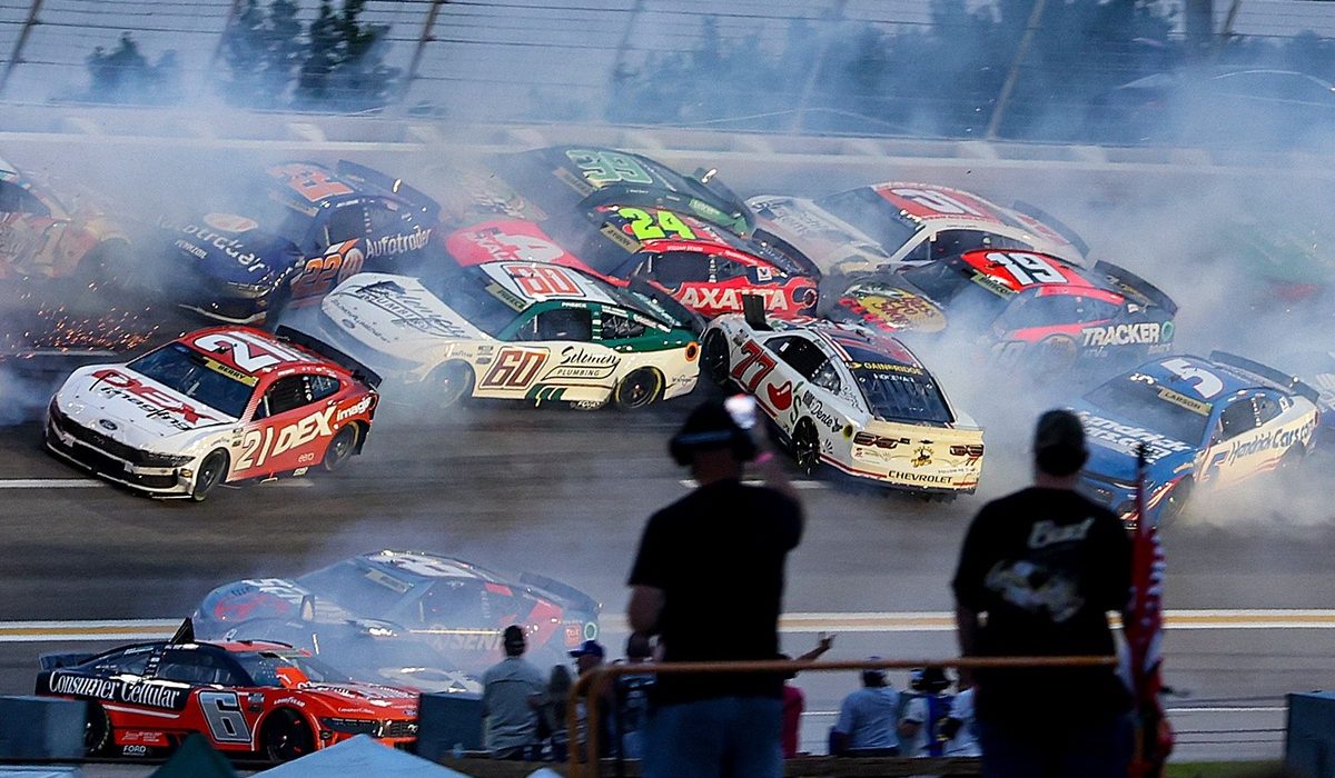 NASCAR halts Atlanta Cup race after huge crash collects half the field